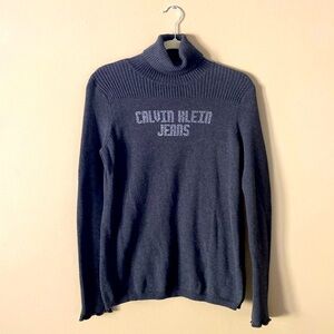 Calvin Klein dark grey turtleneck sweater.